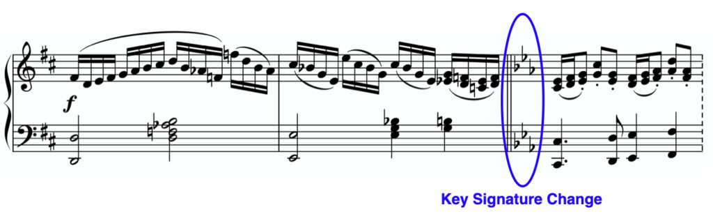 middle of piece key signature change