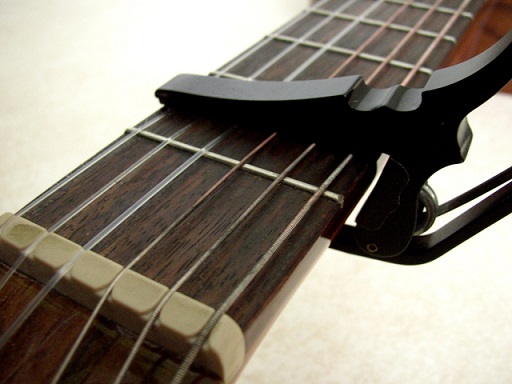 beef Lengthen Memorize Learn how to use a Capo on a Guitar - Liberty Park Music